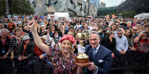Melbourne Lord Mayor Sally Capp and Victoria Racing Club chairman Neil Wilson with the Melbourne Cup parade crowd at Federation Square last year.