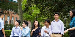 The seven James Ruse students who received an ATAR of 99.95,from left to right:Winston Huang (standing),Eric Huang;Anthony Hwang;Sariena Ye;Dineth Fernando;Alexander Van Phan;Grace Li.