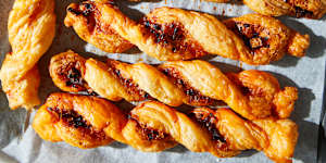 Cheese straws twisted with chilli crisp.