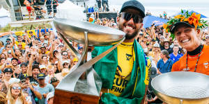Winners are grinners:2022 world champions Filipe Toledo and Stephanie Gilmore.