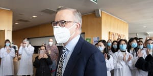 Anthony Albanese and Mark Butler wore masks when not speaking at their press conference in Melbourne. 
