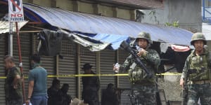 Philippine troops battle Muslim militants after church blast