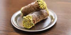 Ricotta-filled cannoli come with the correct ratio of pistachio nuts.