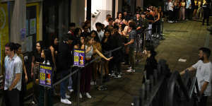 Queues outside the Cliff Dive nightclub at Oxford Square on a Saturday night.