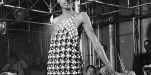 A mini dress made of lacquered aluminium discs designed by Paco Rabanne. 