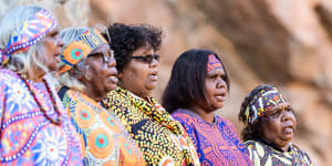 Members of the Central Australian Aboriginal Women’s Choir will perform a new version of the national anthem that they're happy to sing on Sunday at the Desert Song Festival. 