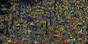 Supporters of Jair Bolsonaro,Brazil’s former president,march on Avenida Paulista in Sao Paulo on Sunday.
