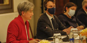 Penny Wong gives a speech to her Chinese counterpart Wang Yi at the G20 meeting in July. 
