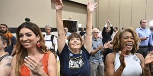 People applaud during a primary watch party in Overland Park,Kansas. State voters rejected a ballot measure in the conservative state with deep ties to the anti-abortion movement.