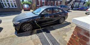 A pilot scheme in Central Bedfordshire Council in England allows electric vehicle owners to charge their cars on the street outside their homes with a charging cable embedded into the pavement.
