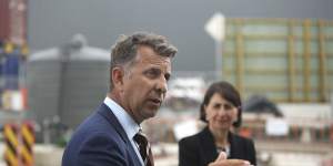 Transport Minister Andrew Constance,pictured with Premier Gladys Berejiklian,says NSW should subsidise the entry of electric vehicles into the NSW market.