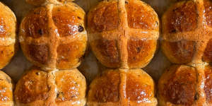 Hot cross buns at Fiore Bread in McMahons Point include Earl Grey-soaked currants,orange pulp,apricot cardamom jam glaze and an almond frangipane cross.