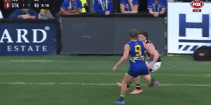 Harley Reid tackles Darcy Wilson,an act that has seen him offered a two-week suspension.