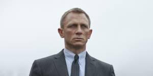 James Bond (Daniel Craig) and his trusty car (not a Toyota).
