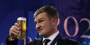 Port Adelaide’s Ollie Wines toasts his victory.