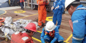 Recovery teams sift through debris believed to be from the crashed Lion Air flight. 