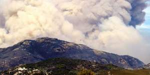 Smoke rising from the Wilsons Promontory fire that ran out of control and forced the evacuation of hundreds of trapped visitors in 2005.