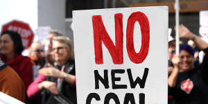 Adani-Adani protesters outside engineering construction company GHD in Brisbane on August 1. The Carmichael coal mine has become a lightning rod for the anti-coal movement.