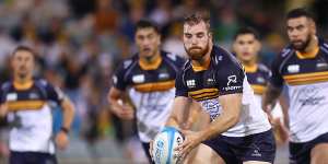 Hudson Creighton of the Brumbies looking for space in Canberra