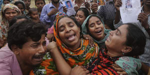 Relatives of a garment worker who perished in the 2013 Rana Plaza tragedy. Since then,the fashion industry has been under pressure to clean up its act.