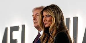 President Donald Trump and first lady Melania Trump arrive for the premiere of her movie in Washington.