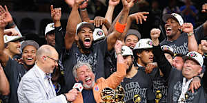 New York Knick owner James Dolan in the centre of the celebrations.