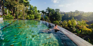 In Bali,you can take a dip surrounded by nature.