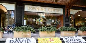 Banners reading"Justice for David Dungay"outside the Downing Centre Court in Sydney on Monday. 