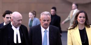 Former NSW One Nation leader Mark Latham arrives at the Federal Court in Sydney on Wednesday for the first day of the defamation trial.