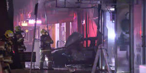 Firefighters contained the blaze to the vehicle and the front of the Altona store on Friday morning.