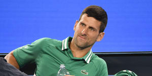 Novak Djokovic receives medical treatment.