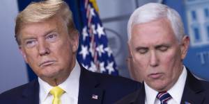 Donald Trump and his Vice-President,Mike Pence,at the news conference on Monday where the US President foreshadowed a"very dramatic"stimulus package.