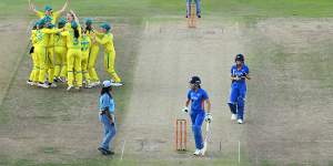 Australian players celebrate after Jess Jonassen took the final wicket.