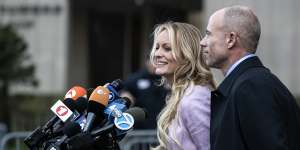 Stephanie Clifford,the pornographic film star better known as Stormy Daniels,and Michael Avenatti,then her attorney,speak to reporters in New York on April 16,2018. 
