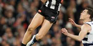 Darcy Moore flies high for the Magpies.