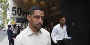 Cody Walker and Michael Chee Kam leave the US Consulate on Thursday.