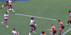 Haumole Olakau’atu bursts through the Tigers defence. 