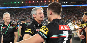 Nathan Cleary celebrates with his father and coach Ivan Cleary.