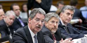 From left to right,Deputy Attorney General James Cole,Robert S. Litt,general counsel in the Office of Director of National Intelligence,National Security Agency Deputy Director John C. Inglis.