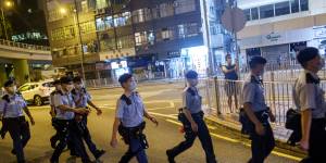 Hong Kong locks down Tiananmen vigil park,police arrest organiser
