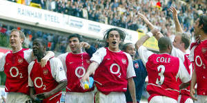 Arsenal celebrate winning the league at Tottenham’s former home ground two decades ago.