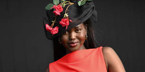 Engaged,and engaging ... Adut Akech Bior at the Melbourne Cup.
