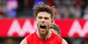 Dane Rampe of the Swans celebrates a goal during the Qualifying Final against the Giants