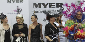 Dame Edna judges fashion at Flemington race track on Derby Day in 2010.