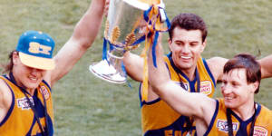 Former Eagles Glen Jakovich,Peter Sumich,John Worsfold with football's most sought-after prize. 