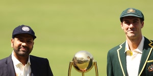 Rohit Sharma and Pat Cummins with the Border–Gavaskar Trophy on Thursday.