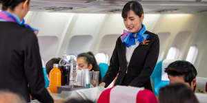 Cabin crew typically serve meals shortly after take-off and before landing.