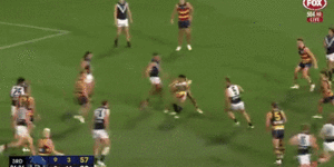 Port Adelaide’s Jason Horne-Francis did not dispose of the ball and was not pinged for holding the ball despite being spun around multiple times in this tackle from an Adelaide opponent in Thursday’s Showdown.