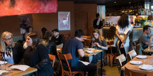 The dark and moody interior is reminiscent of Caffe e Cucina,Maurice Terzini's first Melbourne restaurant.