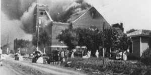 The University of Tulsa,The Mt. Zion Baptist Church burns in Tulsa,Okla. during the Tulsa Race Massacre of June 1,1921. 